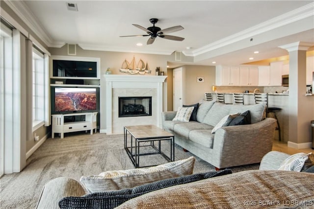 68 Lighthouse Rd Unit 906, Lake Ozark, MO 65049 - living room with ornamental molding, ceiling fan, a fireplace, recessed lighting, and light carpet
