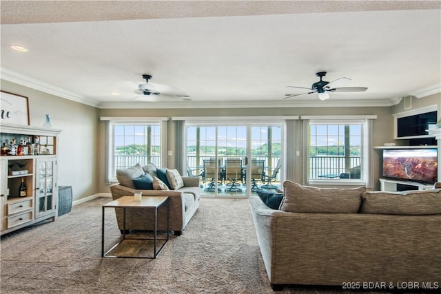 68 Lighthouse Rd Unit 906, Lake Ozark, MO 65049 - living room with ceiling fan, ornamental molding, carpet flooring, healthy amount of natural light, and recessed lighting
