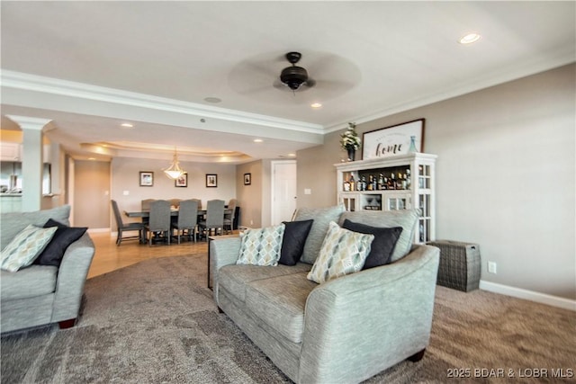 68 Lighthouse Rd Unit 906, Lake Ozark, MO 65049 - living room featuring crown molding, a ceiling fan, recessed lighting, and decorative columns
