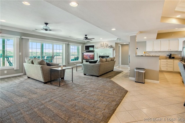 68 Lighthouse Rd Unit 906, Lake Ozark, MO 65049 - living area with a ceiling fan, crown molding, light tile patterned floors, recessed lighting, and a fireplace
