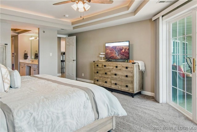 68 Lighthouse Rd Unit 906, Lake Ozark, MO 65049 - bedroom featuring access to exterior, carpet flooring, a tray ceiling, ceiling fan, and ensuite bathroom