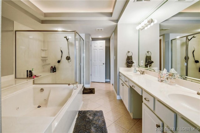 68 Lighthouse Rd Unit 906, Lake Ozark, MO 65049 - bathroom featuring a stall shower, tile patterned flooring, double vanity, and a whirlpool tub