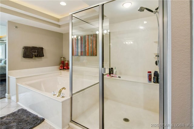 68 Lighthouse Rd Unit 906, Lake Ozark, MO 65049 - full bathroom featuring tile patterned floors, a stall shower, a bath, recessed lighting, and connected bathroom