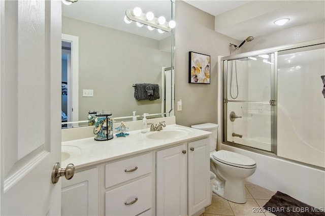 68 Lighthouse Rd Unit 906, Lake Ozark, MO 65049 - bathroom with tile patterned flooring, double vanity, and enclosed tub / shower combo