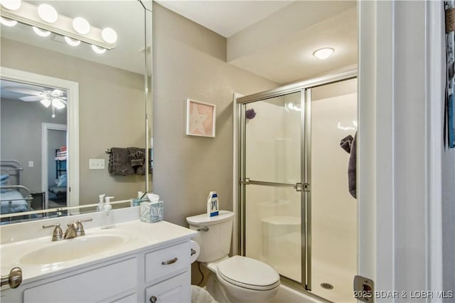68 Lighthouse Rd Unit 906, Lake Ozark, MO 65049 - ensuite bathroom featuring a stall shower, vanity, and a ceiling fan