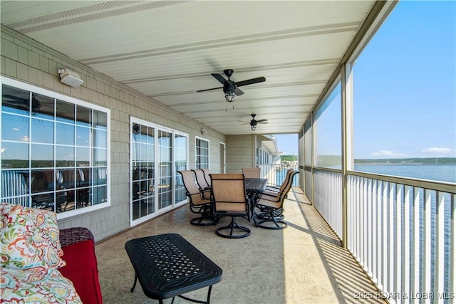 68 Lighthouse Rd Unit 906, Lake Ozark, MO 65049 - sunroom / solarium with a water view, a ceiling fan, and outdoor dining space