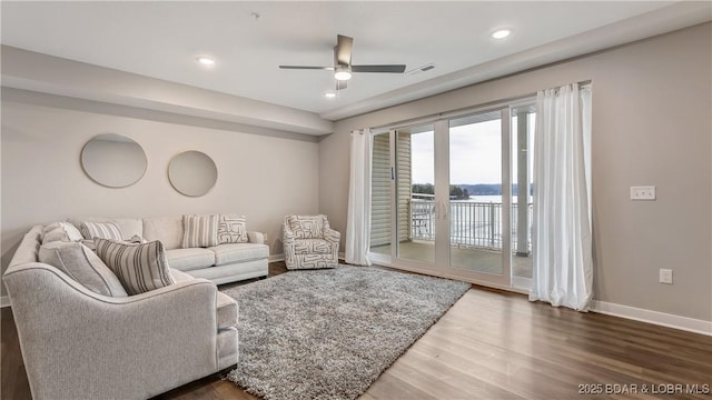 104 Sierra Bay Dr Unit 1B, Camdenton, MO 65020 - living area with a ceiling fan, wood finished floors, a water view, and recessed lighting