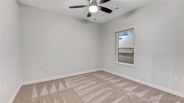 104 Sierra Bay Dr Unit 1B, Camdenton, MO 65020 - carpeted empty room featuring baseboards and ceiling fan