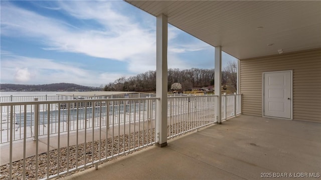 104 Sierra Bay Dr Unit 1B, Camdenton, MO 65020 - patio / terrace featuring a water view