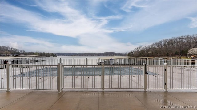 104 Sierra Bay Dr Unit 1B, Camdenton, MO 65020 - view of pool featuring a water view and a patio