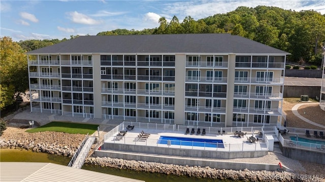 104 Sierra Bay Dr Unit 1B, Camdenton, MO 65020 - view of apartment building / complex with a community pool and a water view