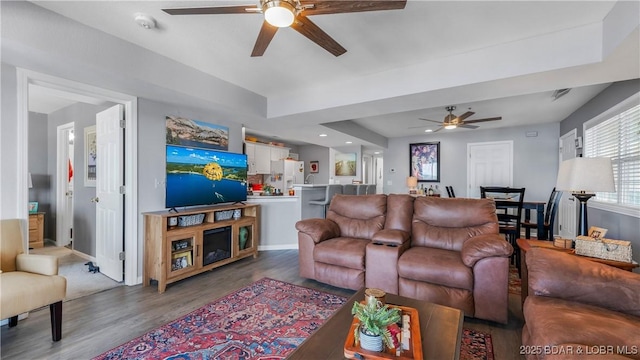 1201 W Harbour Towne Dr Unit 1201, Lake Ozark, MO 65049 - living room featuring ceiling fan and wood finished floors