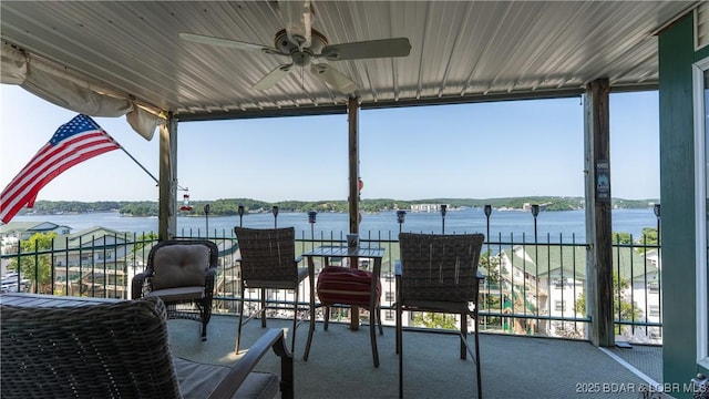 1201 W Harbour Towne Dr Unit 1201, Lake Ozark, MO 65049 - view of patio featuring a water view and a ceiling fan