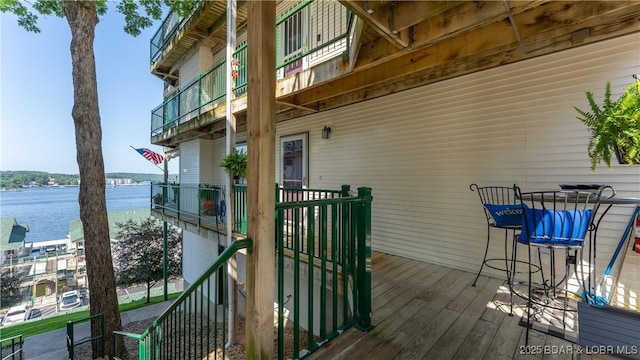 1201 W Harbour Towne Dr Unit 1201, Lake Ozark, MO 65049 - wooden terrace featuring a water view