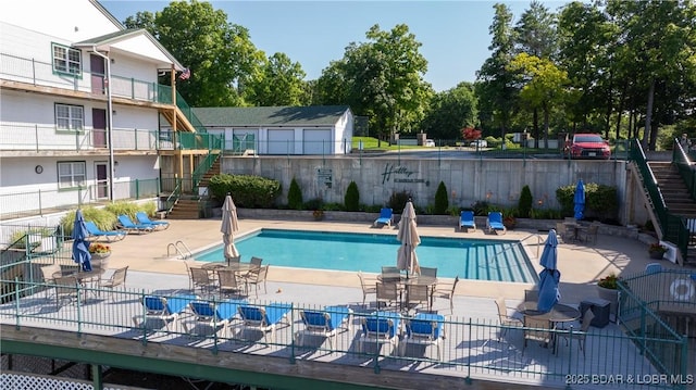 1201 W Harbour Towne Dr Unit 1201, Lake Ozark, MO 65049 - community pool featuring stairs and a patio
