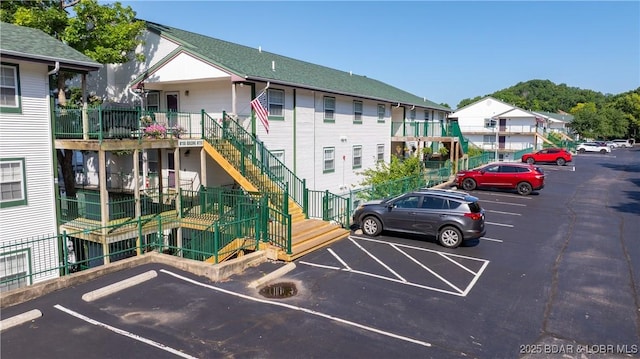1201 W Harbour Towne Dr Unit 1201, Lake Ozark, MO 65049 - uncovered parking lot with stairway