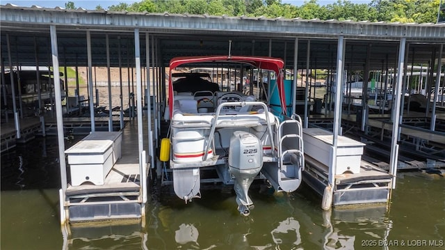 1201 W Harbour Towne Dr Unit 1201, Lake Ozark, MO 65049 - dock featuring boat lift