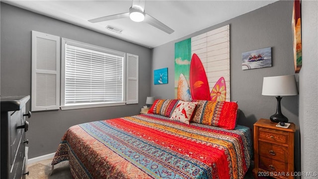 1201 W Harbour Towne Dr Unit 1201, Lake Ozark, MO 65049 - carpeted bedroom with a ceiling fan and baseboards