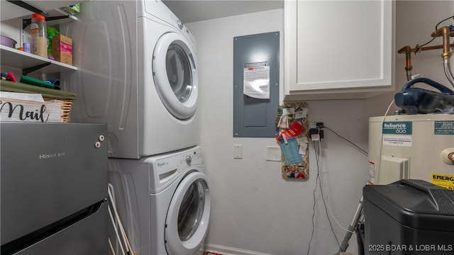 1201 W Harbour Towne Dr Unit 1201, Lake Ozark, MO 65049 - washroom featuring cabinet space, stacked washer / dryer, electric panel, and water heater