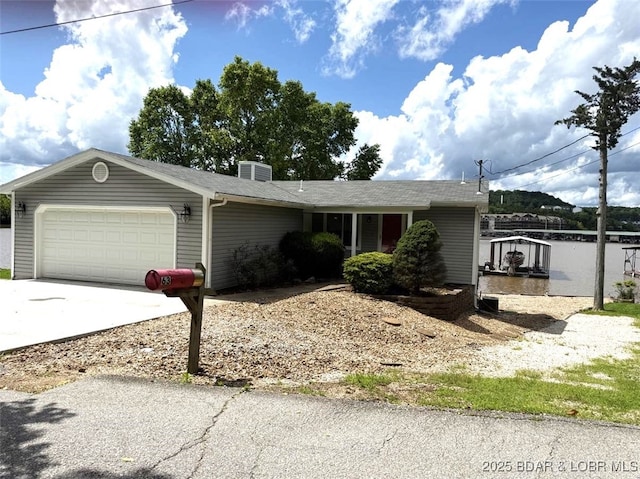 63 Rock Dove Ln, Camdenton, MO 65020 - ranch-style home with an attached garage, driveway, and a chimney