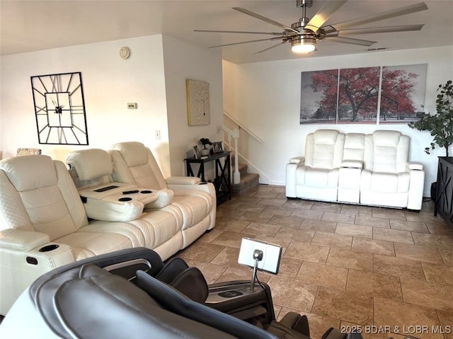 63 Rock Dove Ln, Camdenton, MO 65020 - living room with ceiling fan, stairs, and stone finish flooring