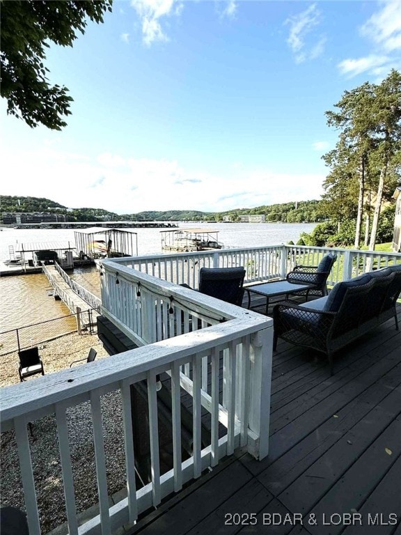 63 Rock Dove Ln, Camdenton, MO 65020 - deck featuring a water view