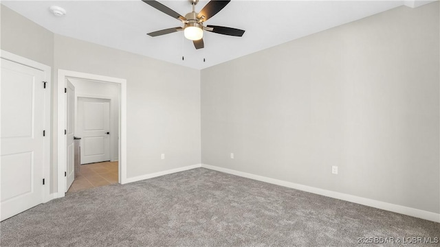 104 Sierra Bay Dr Unit 1C, Camdenton, MO 65020 - spare room featuring carpet and ceiling fan