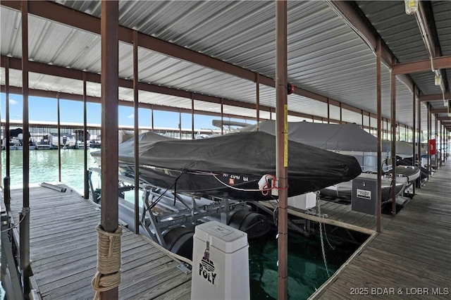 2500 Bay Point Dr Unit 331, Osage Beach, MO 65065 - dock area featuring boat lift