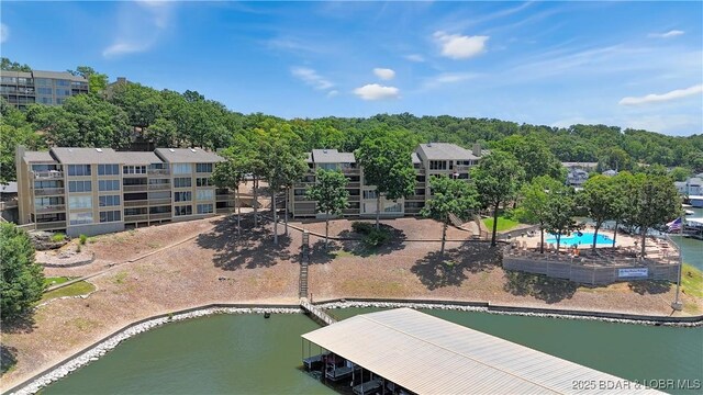 2500 Bay Point Dr Unit 331, Osage Beach, MO 65065 - bird's eye view of a pool and a nearby body of water