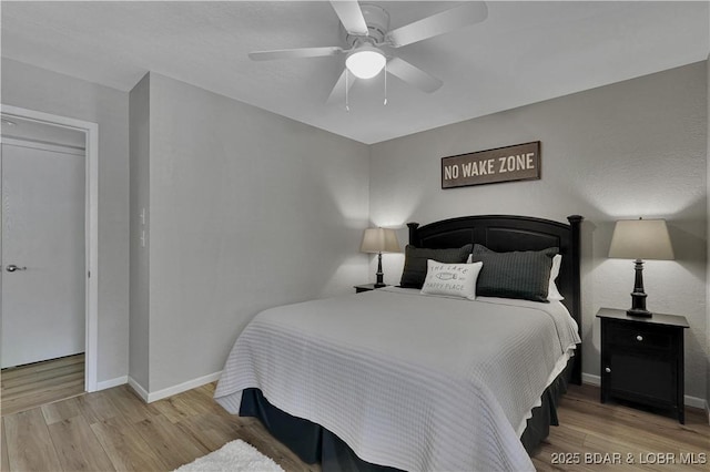 2500 Bay Point Dr Unit 331, Osage Beach, MO 65065 - bedroom with wood finished floors and ceiling fan