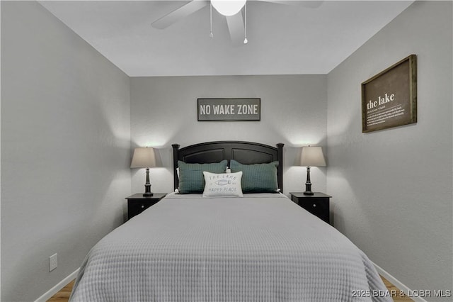 2500 Bay Point Dr Unit 331, Osage Beach, MO 65065 - bedroom with wood finished floors and a ceiling fan