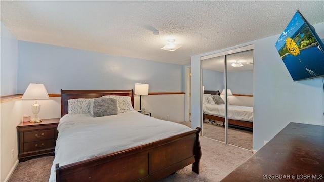 121 W 9th St, Eldon, MO 65026 - bedroom with carpet floors, a closet, and a textured ceiling