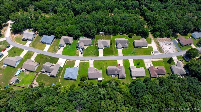 396 Elm Tree Ln, Camdenton, MO 65020 - aerial view of property and surrounding area featuring nearby suburban area and a forest