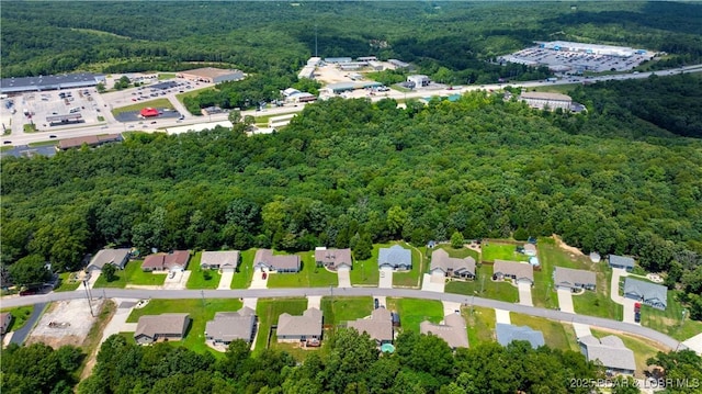 396 Elm Tree Ln, Camdenton, MO 65020 - aerial overview of property's location featuring a forest and nearby suburban area