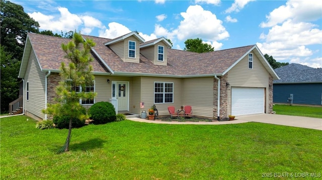 396 Elm Tree Ln, Camdenton, MO 65020 - cape cod house featuring an attached garage, driveway, stone siding, and a front lawn