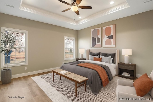 60 Lady Bug Ln, Camdenton, MO 65020 - bedroom featuring a tray ceiling, ornamental molding, light wood-style flooring, recessed lighting, and a ceiling fan