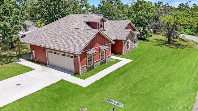 60 Lady Bug Ln, Camdenton, MO 65020 - view of front of property with board and batten siding, stone siding, driveway, and a front lawn