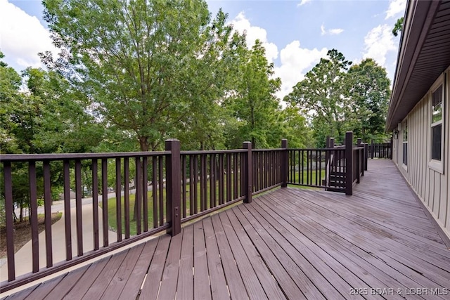 1408 Dogwood Ln, Osage Beach, MO 65065 - deck featuring view of wooded area