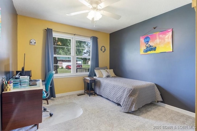 901 Larkin Dr, Eldon, MO 65026 - carpeted bedroom with ceiling fan and a desk