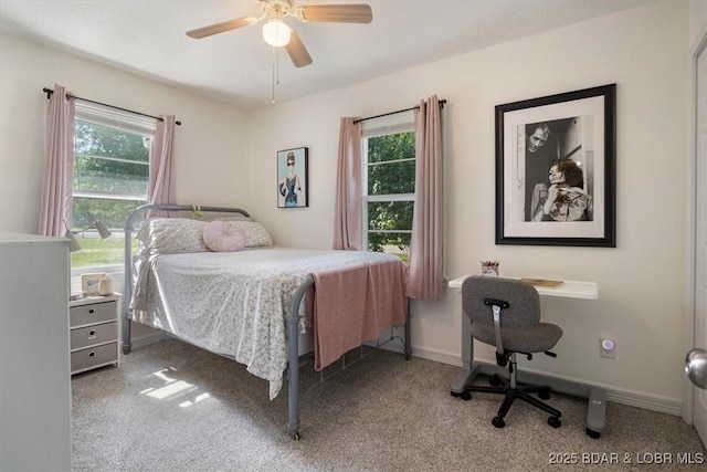 901 Larkin Dr, Eldon, MO 65026 - bedroom with multiple windows, carpet, and a ceiling fan