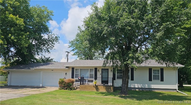 901 Larkin Dr, Eldon, MO 65026 - single story home with concrete driveway, an attached garage, and a front lawn