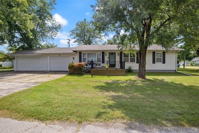 901 Larkin Dr, Eldon, MO 65026 - ranch-style house featuring an attached garage, concrete driveway, a front lawn, and covered porch