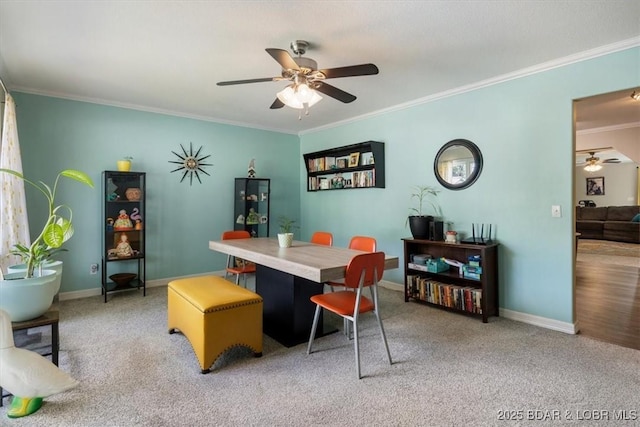 901 Larkin Dr, Eldon, MO 65026 - carpeted dining area with a ceiling fan and crown molding