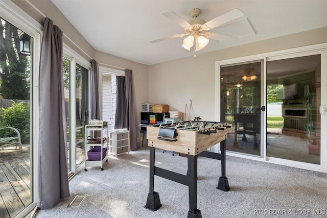 901 Larkin Dr, Eldon, MO 65026 - rec room featuring carpet floors, ceiling fan, and a desk