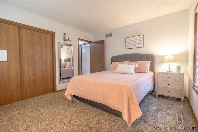 278 Panoramic Dr, Camdenton, MO 65020 - bedroom with carpet floors, a textured ceiling, and a closet