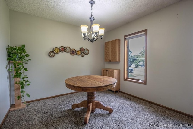 278 Panoramic Dr, Camdenton, MO 65020 - dining space featuring light carpet, a chandelier, and a textured ceiling