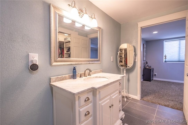 278 Panoramic Dr, Camdenton, MO 65020 - bathroom featuring vanity, tile patterned floors, and a textured wall
