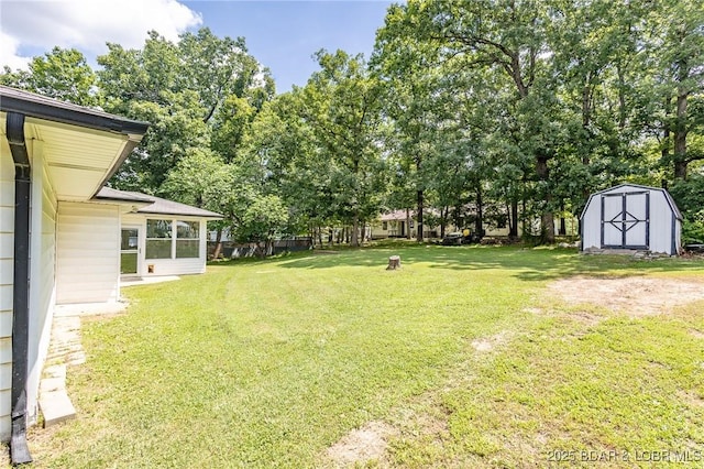 278 Panoramic Dr, Camdenton, MO 65020 - view of green lawn featuring a shed and a sunroom