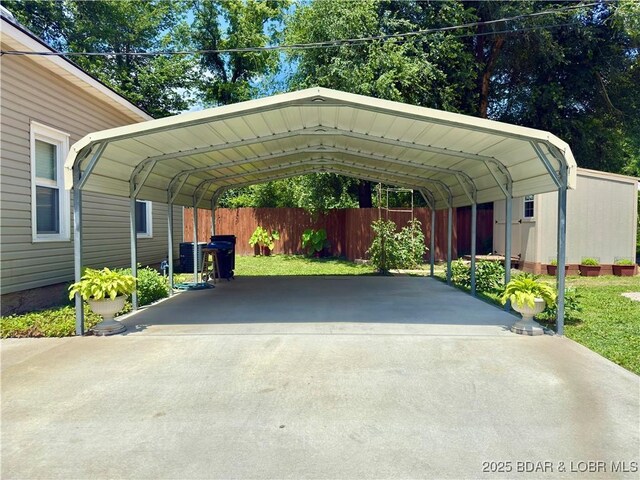 435 Main St, Newburg, MO 65550 - view of parking / parking lot with a detached carport and driveway
