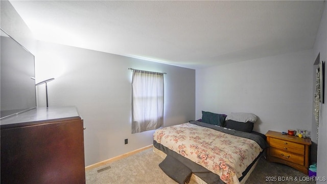 195 Jamie Dr, Camdenton, MO 65020 - bedroom with carpet floors and baseboards